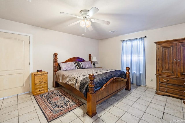 bedroom with light tile patterned floors and ceiling fan