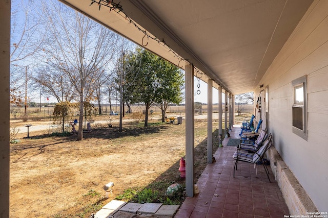 view of yard with a rural view