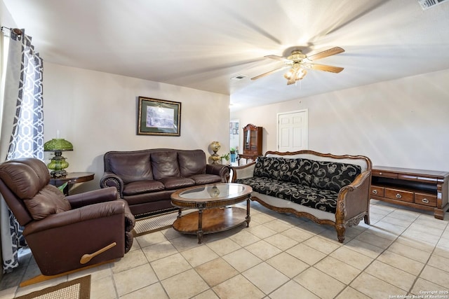 living room with light tile patterned floors and ceiling fan