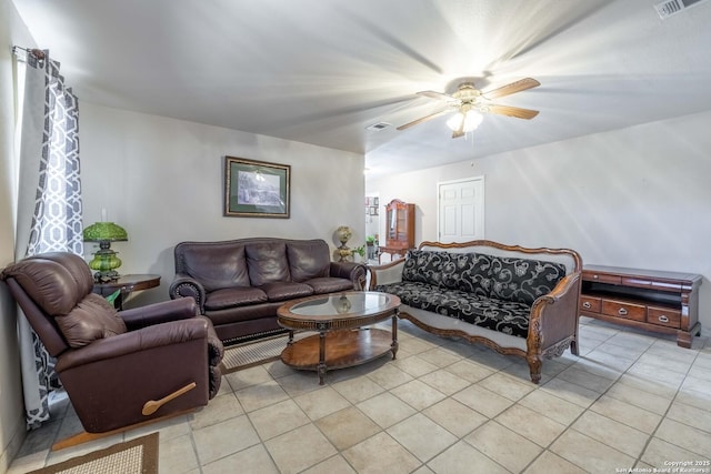 living room with light tile patterned floors and ceiling fan