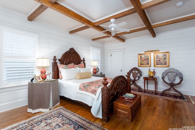 bedroom with dark hardwood / wood-style flooring, coffered ceiling, and beamed ceiling