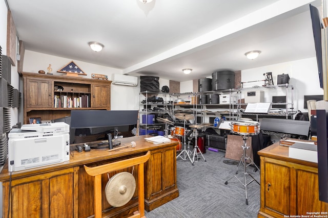 office area with an AC wall unit and carpet