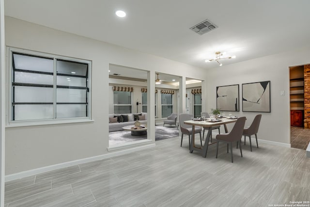 dining space with ceiling fan