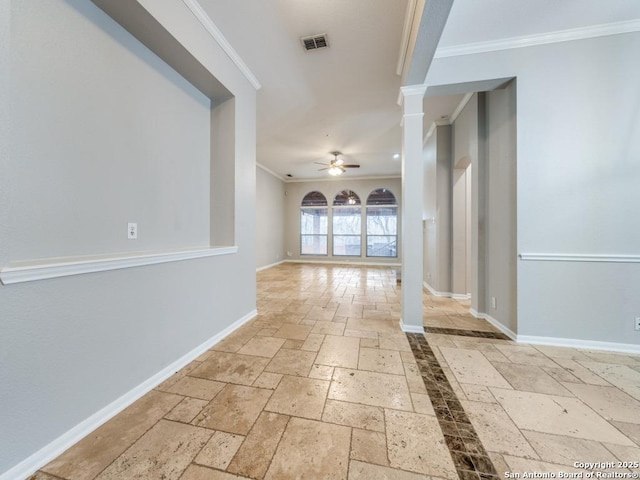 interior space with crown molding, decorative columns, and ceiling fan