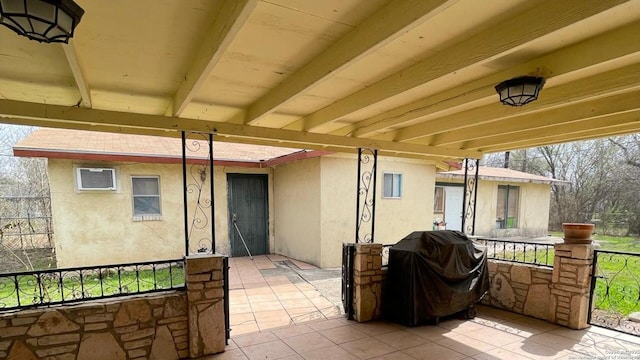 view of patio with a grill