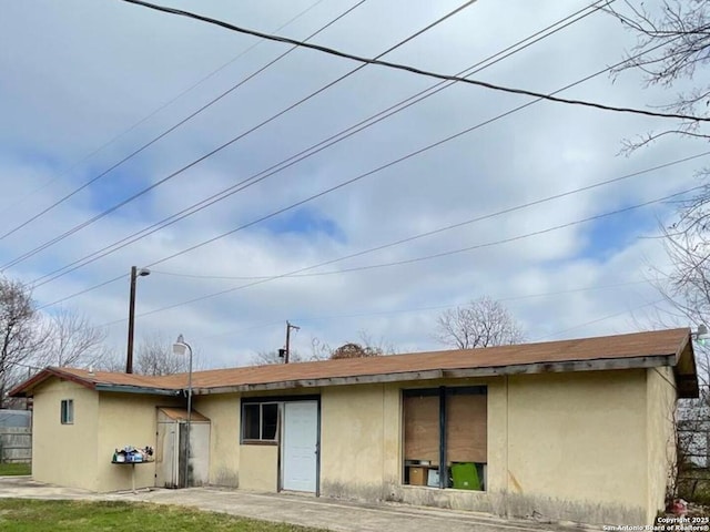 back of house featuring a patio area