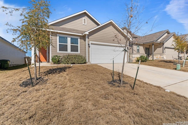 view of front facade with a garage and a front yard