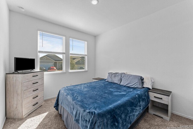 bedroom featuring carpet flooring