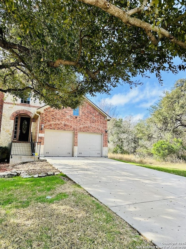 view of front of property with a garage