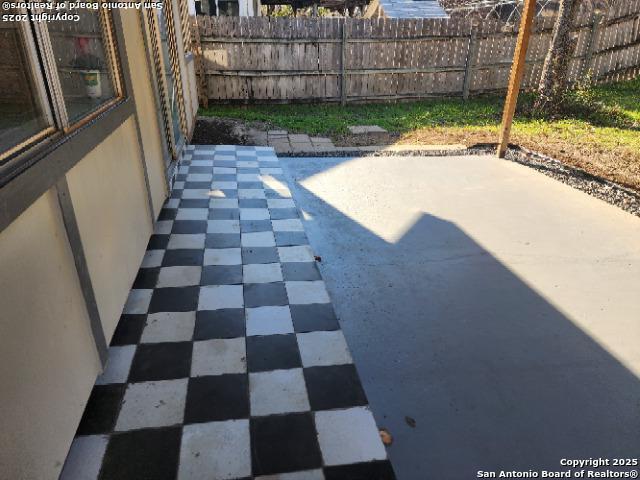 view of patio / terrace with fence