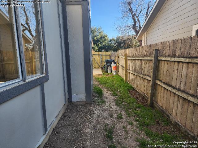 exterior space featuring fence