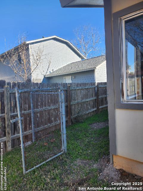 view of yard featuring fence