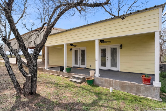 back of property featuring french doors and ceiling fan