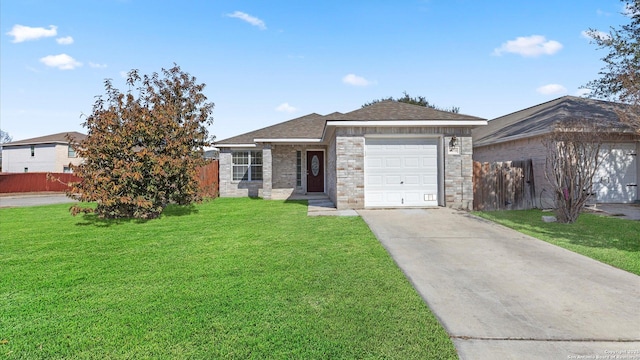 view of front of property with a garage and a front lawn