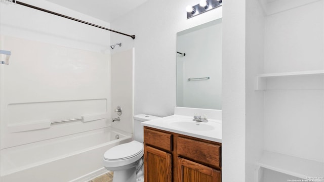 full bathroom featuring vanity, tub / shower combination, and toilet