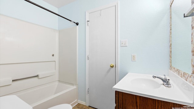 bathroom with vanity and washtub / shower combination