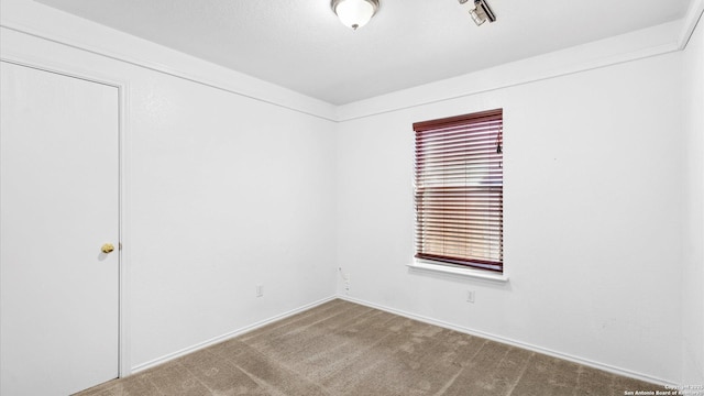 empty room with carpet floors