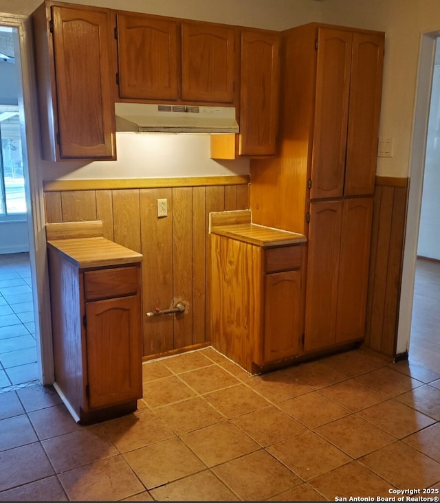 kitchen with light tile patterned floors