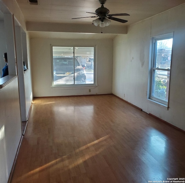 spare room featuring ceiling fan and light wood-type flooring