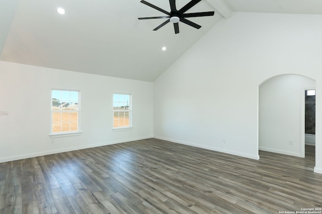 unfurnished living room featuring beam ceiling, ceiling fan, high vaulted ceiling, and dark hardwood / wood-style flooring