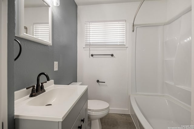 full bathroom with vanity,  shower combination, and toilet