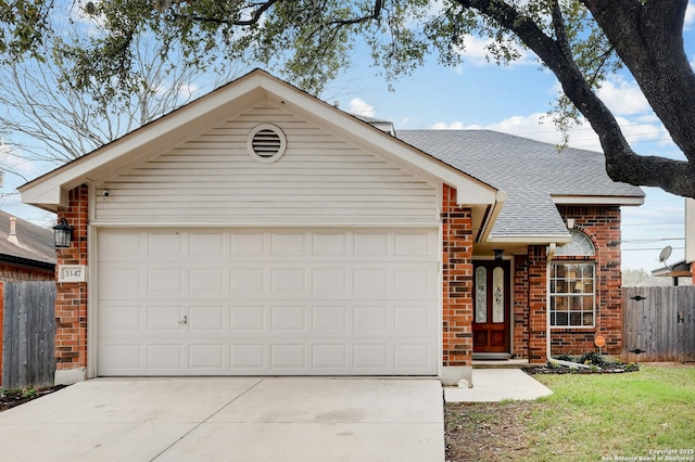 ranch-style home with a garage