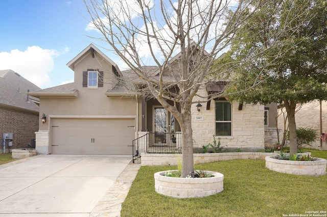 view of front facade featuring a garage and a front yard