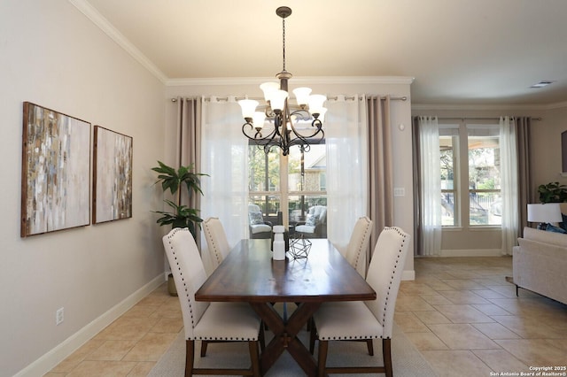 dining room with crown molding and a notable chandelier