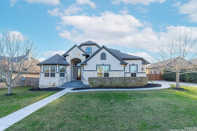 french country home with a front yard