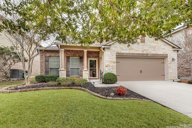 view of front of home with a garage and a front yard