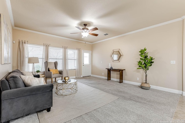 living room with crown molding, light carpet, and ceiling fan