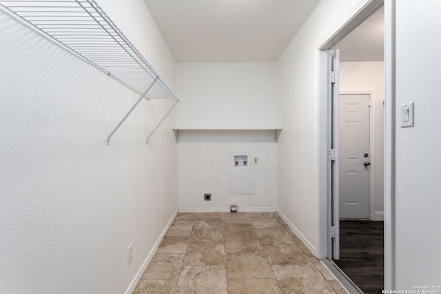 clothes washing area with washer hookup and hookup for an electric dryer