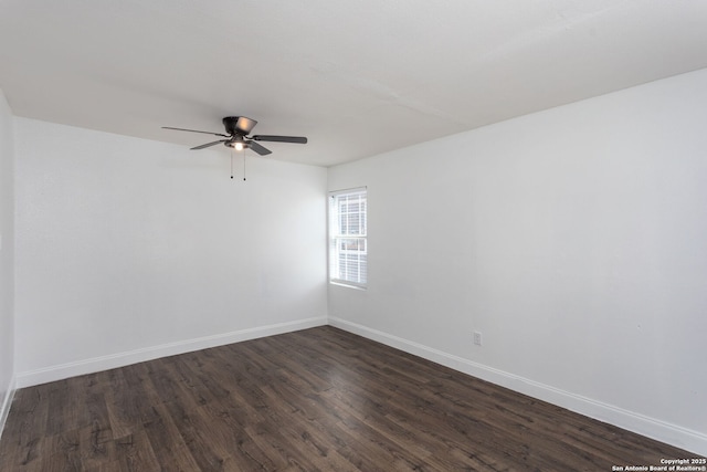 unfurnished room with dark wood-type flooring and ceiling fan