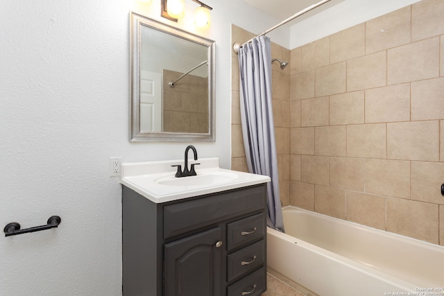 bathroom with shower / bath combination with curtain and vanity