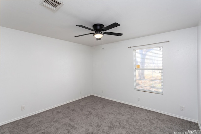 carpeted empty room with ceiling fan