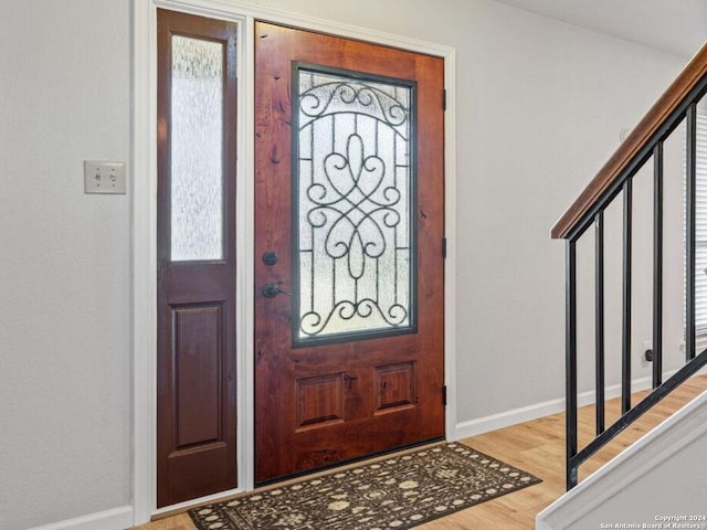 foyer entrance featuring hardwood / wood-style flooring