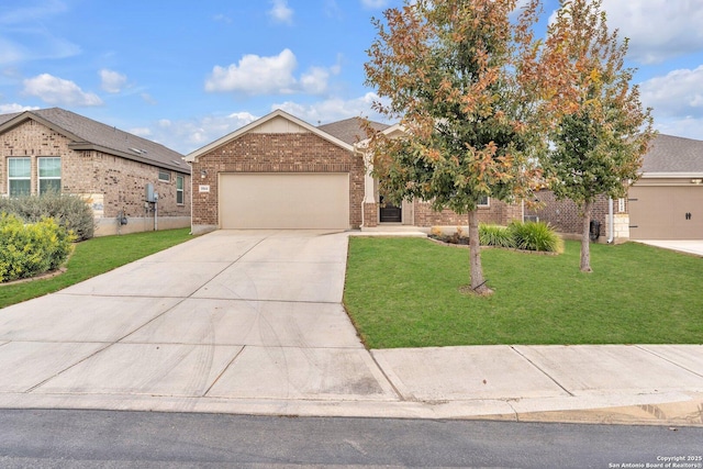 view of front facade with a garage and a front yard