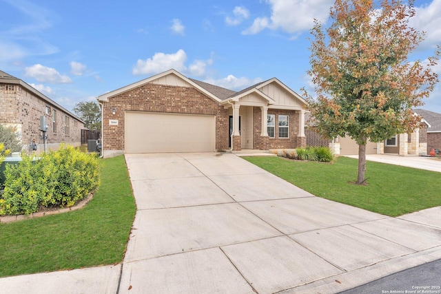 view of front of home featuring a garage and a front lawn