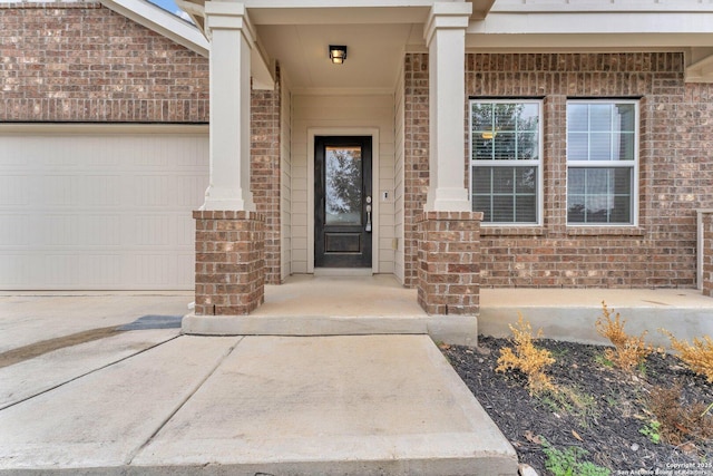 property entrance with a garage