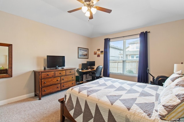 carpeted bedroom featuring vaulted ceiling and ceiling fan