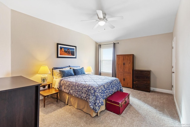 carpeted bedroom with lofted ceiling and ceiling fan