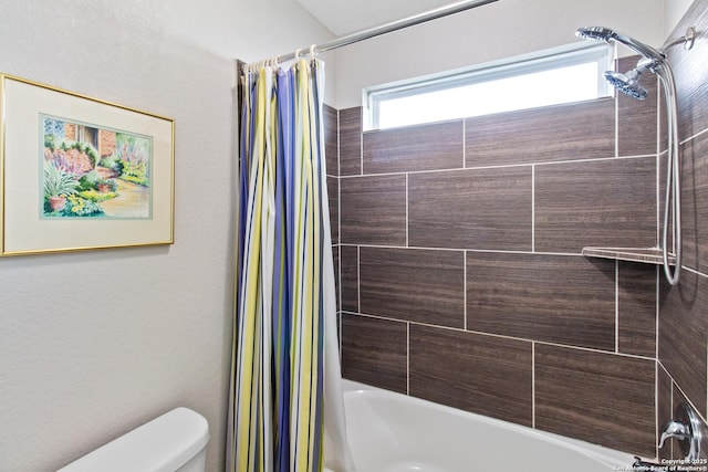 bathroom with toilet and shower / bathtub combination with curtain