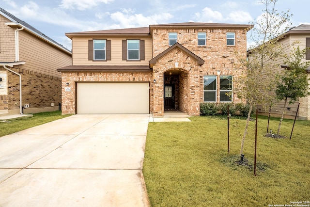 traditional-style house featuring concrete driveway, brick siding, an attached garage, and a front lawn