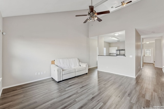 unfurnished room featuring ceiling fan and light wood-type flooring