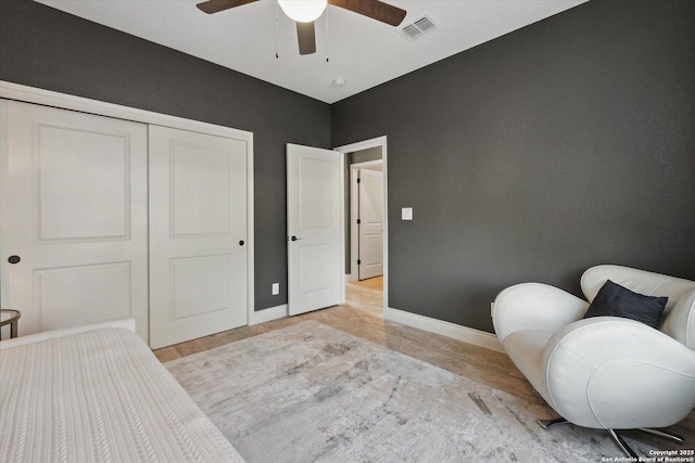 bedroom with a closet and ceiling fan