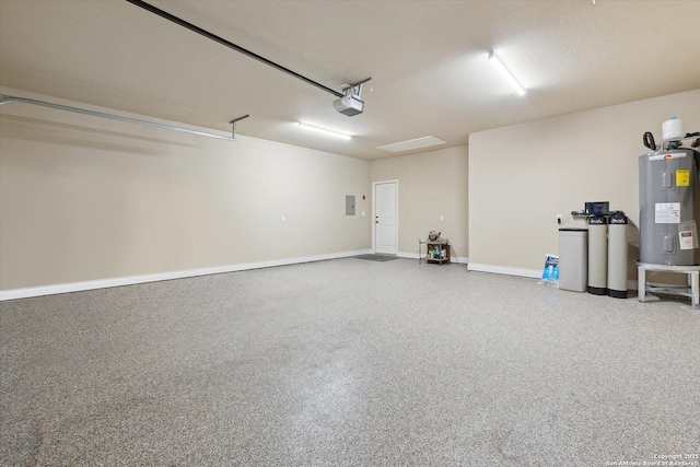 garage with a garage door opener and water heater