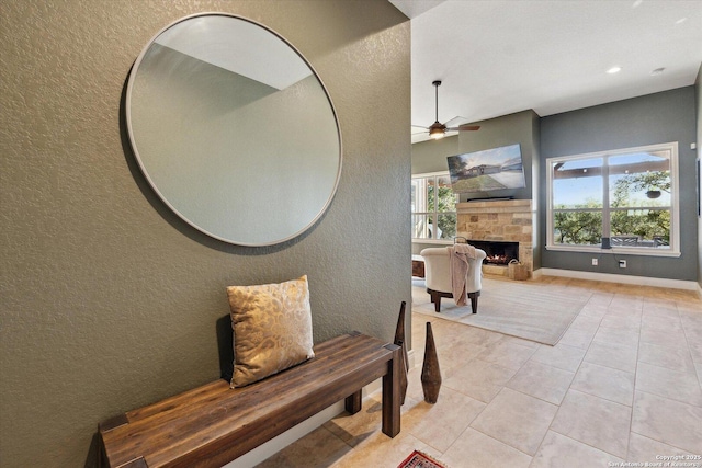 hallway featuring light tile patterned floors