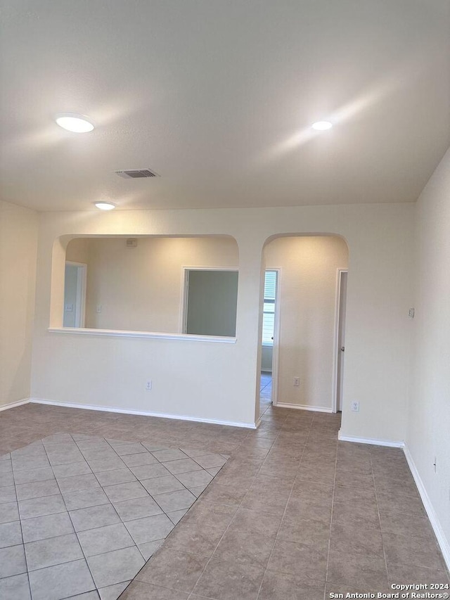 view of tiled spare room