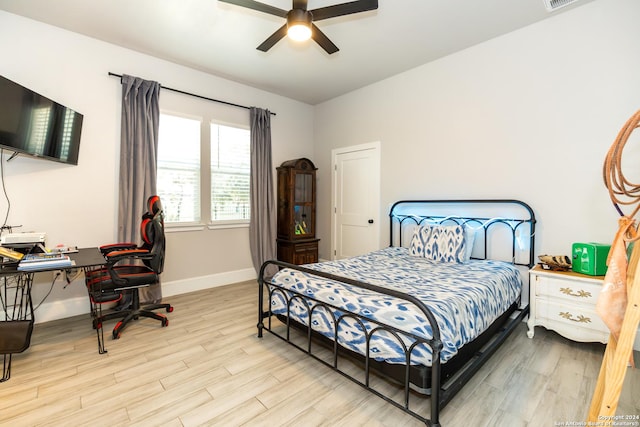 bedroom featuring ceiling fan and light hardwood / wood-style floors