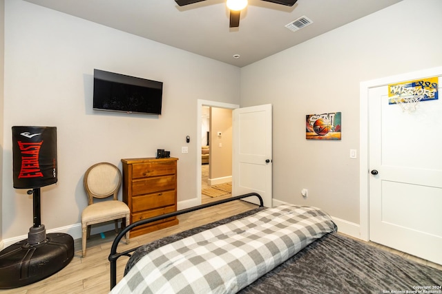 bedroom featuring ceiling fan and light hardwood / wood-style flooring